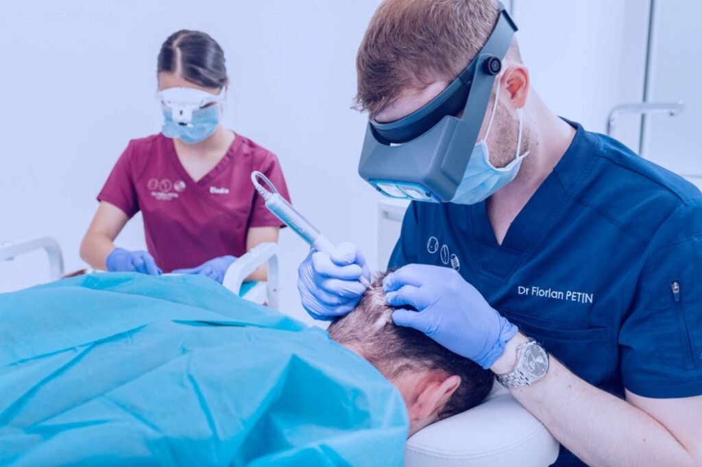 Motorized FUE hair extraction using 0.8–1 mm punches at Haroj Clinic in France for minimally invasive hair transplant surgery.
