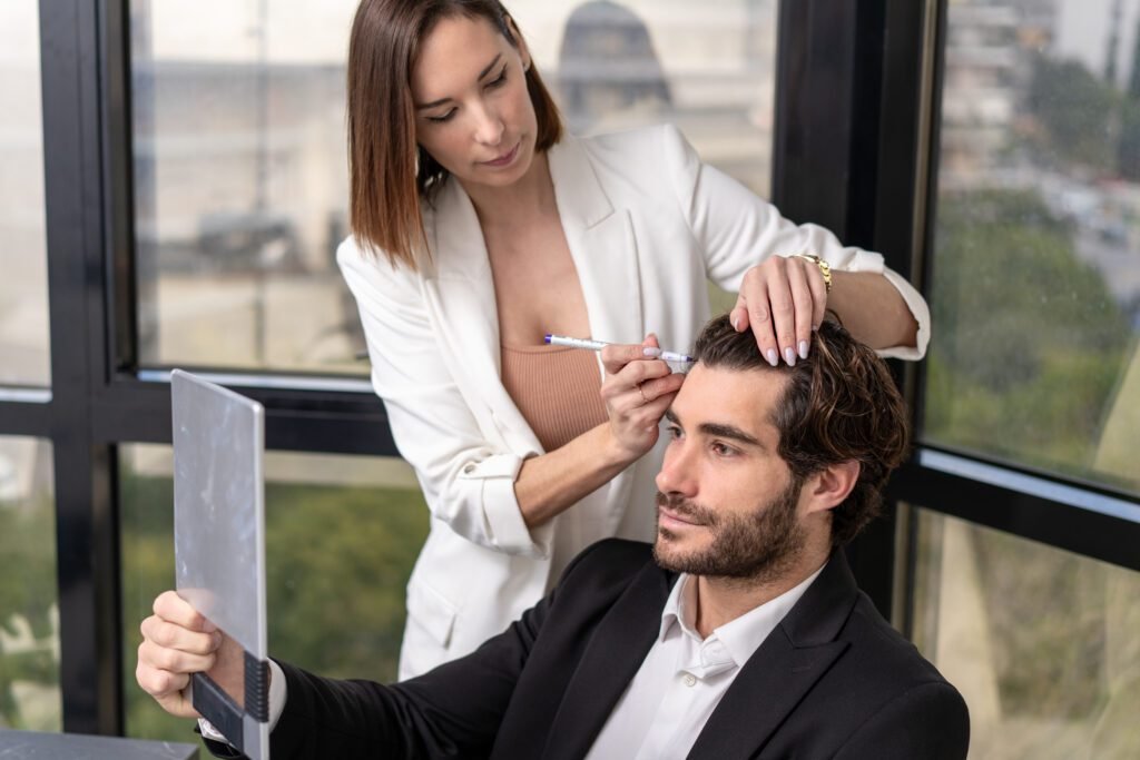 Doctor performing Direct FUE hair transplant procedure at Clinique de Monsieur in Athens