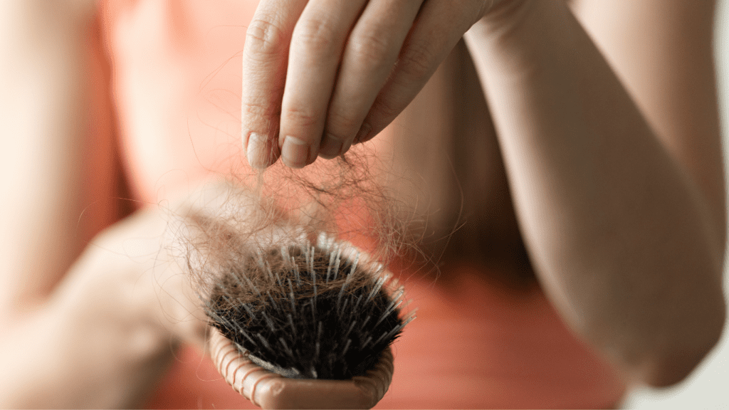 pediatric dermatologist examining child’s scalp for alopecia diagnosis