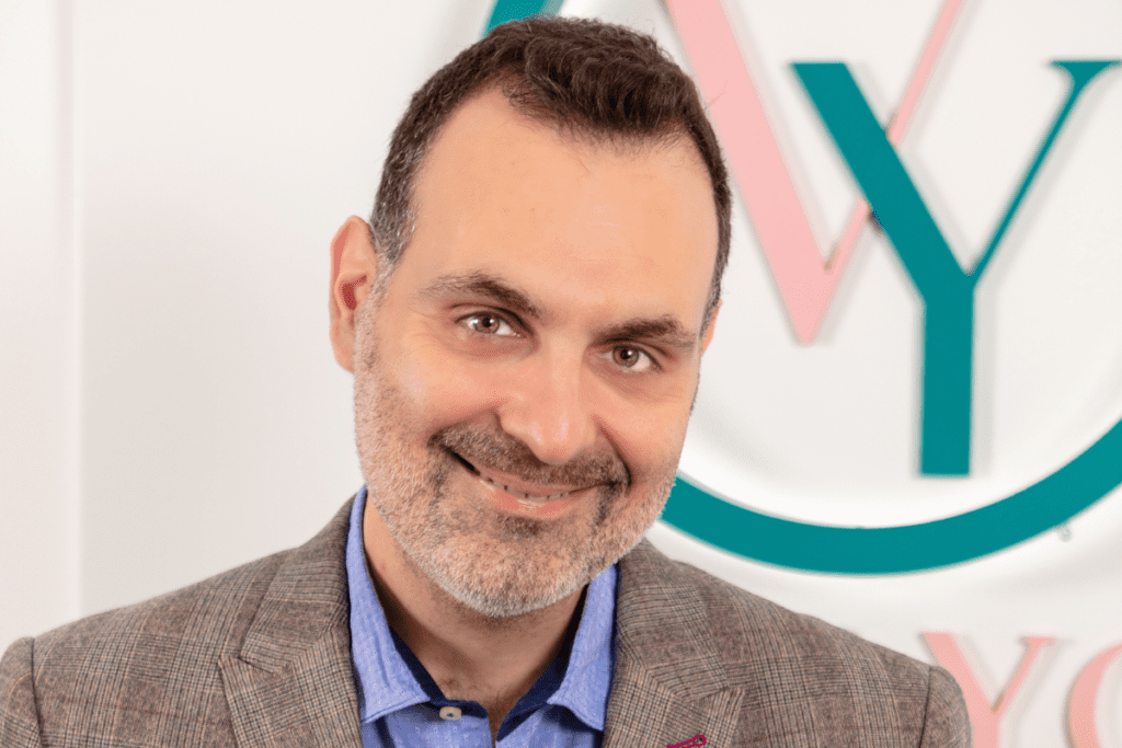 Dr. Papadimitriou performing a hair transplant procedure with precision technique in a clinical setting