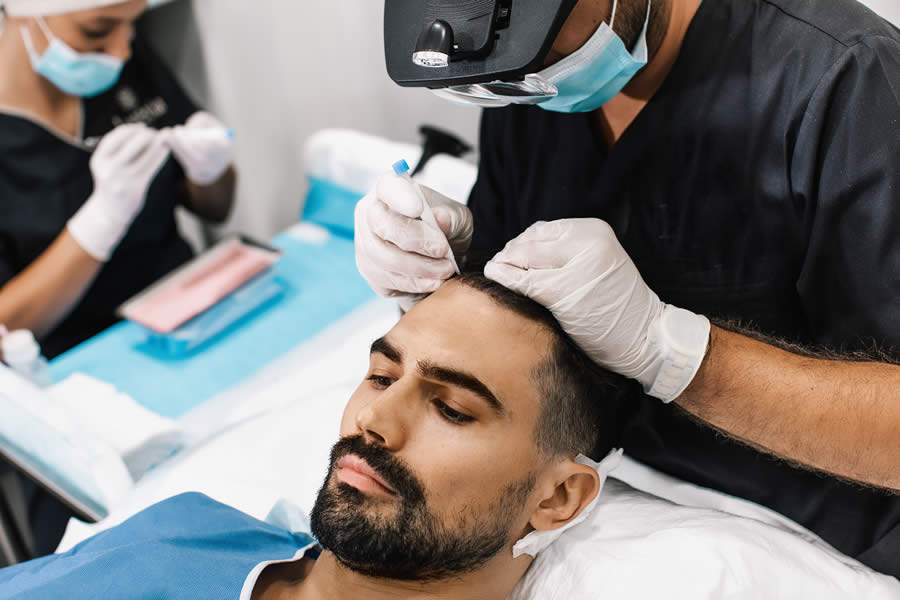 DHI hair transplant pen with single-use safety and precision control