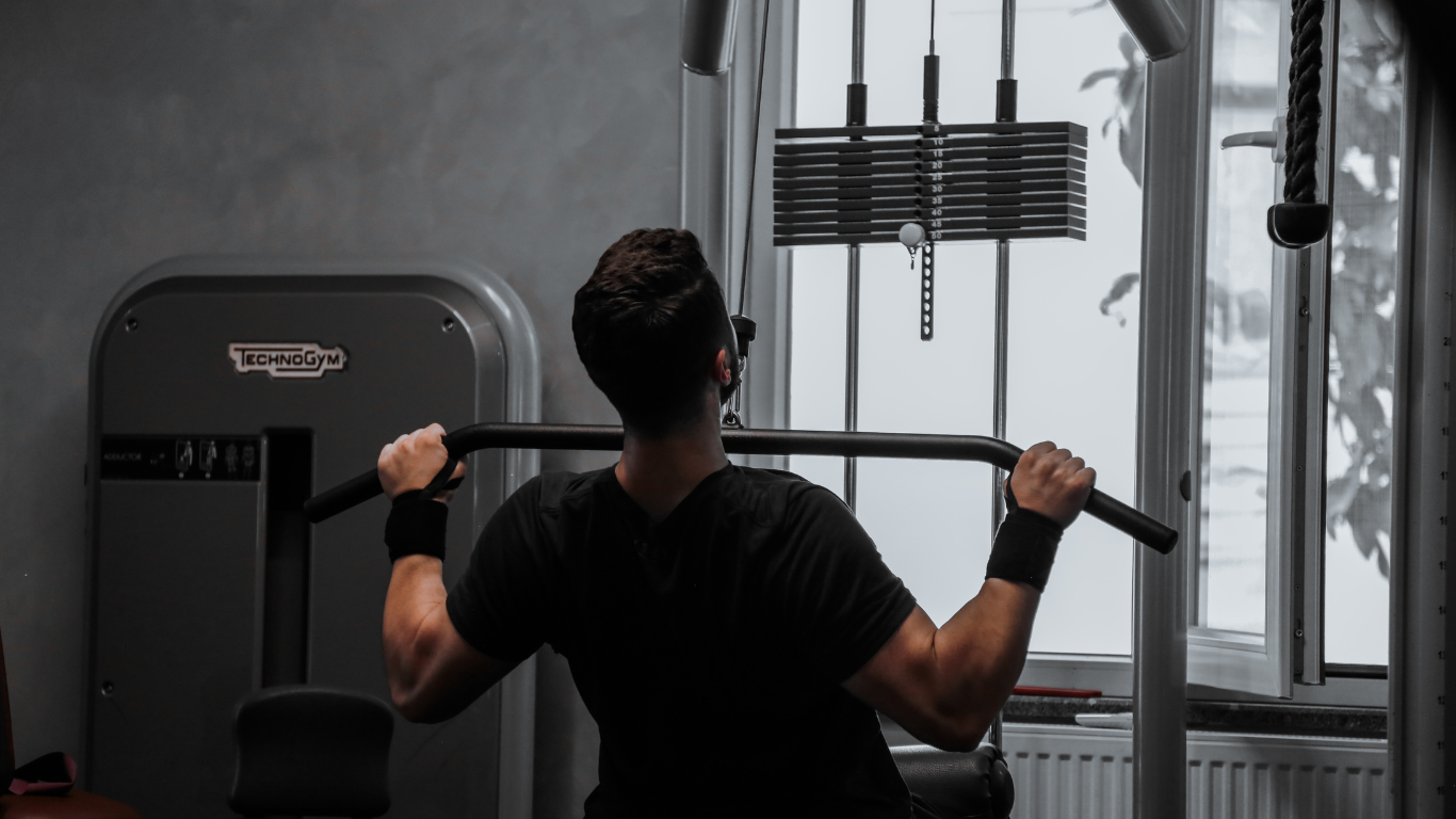 Patient returning to gym workouts after hair transplant recovery